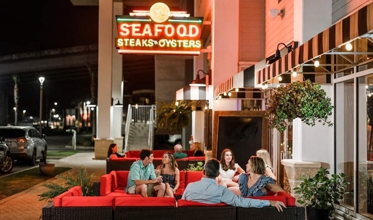 Customers enjoying Ginny Lane's outdoor lounge area